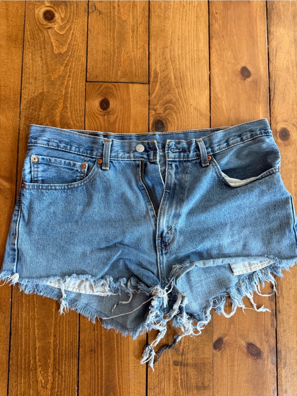 Levi’s High-Rise Distressed Denim Cutoff Shorts - Light Blue